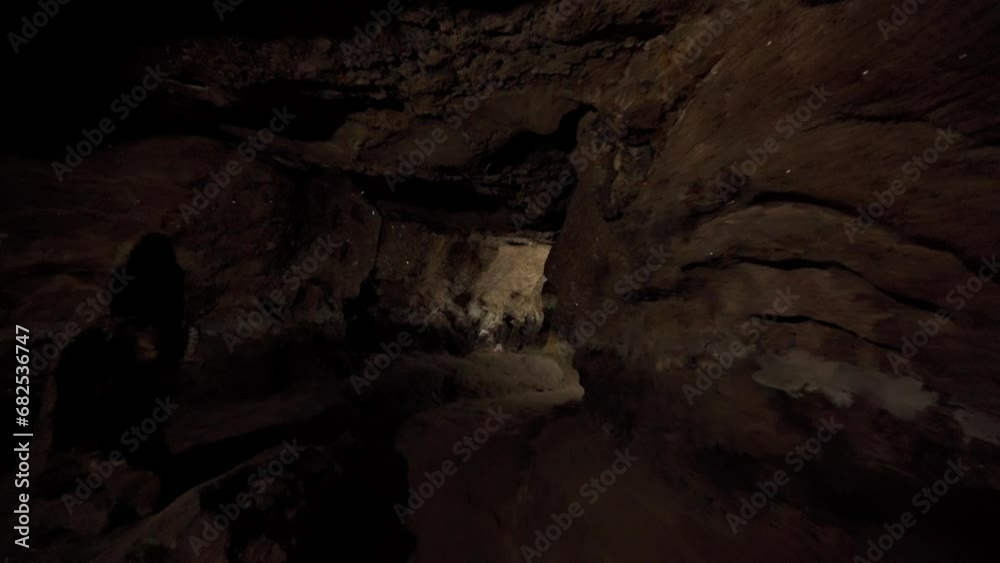 Beautiful video in the middle of the cave. Dark dungeon. Speleology