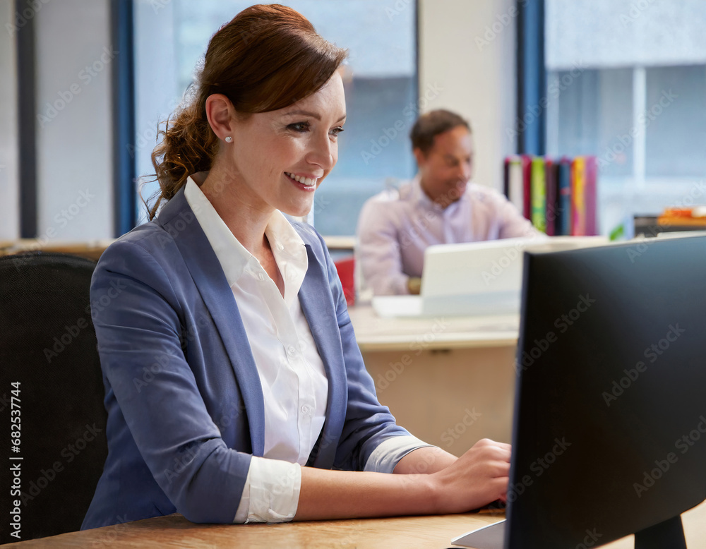 Office worker who works on a computer