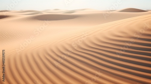 Desert sand ripples shaped by the breeze, resembling a tranquil sea. © Mustafa_Art