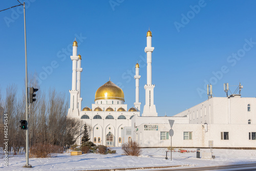 Panoramic view of snow-white with golden dome modern Nur-Astana Mosque, Astana, Kazakhstan. High quality photo