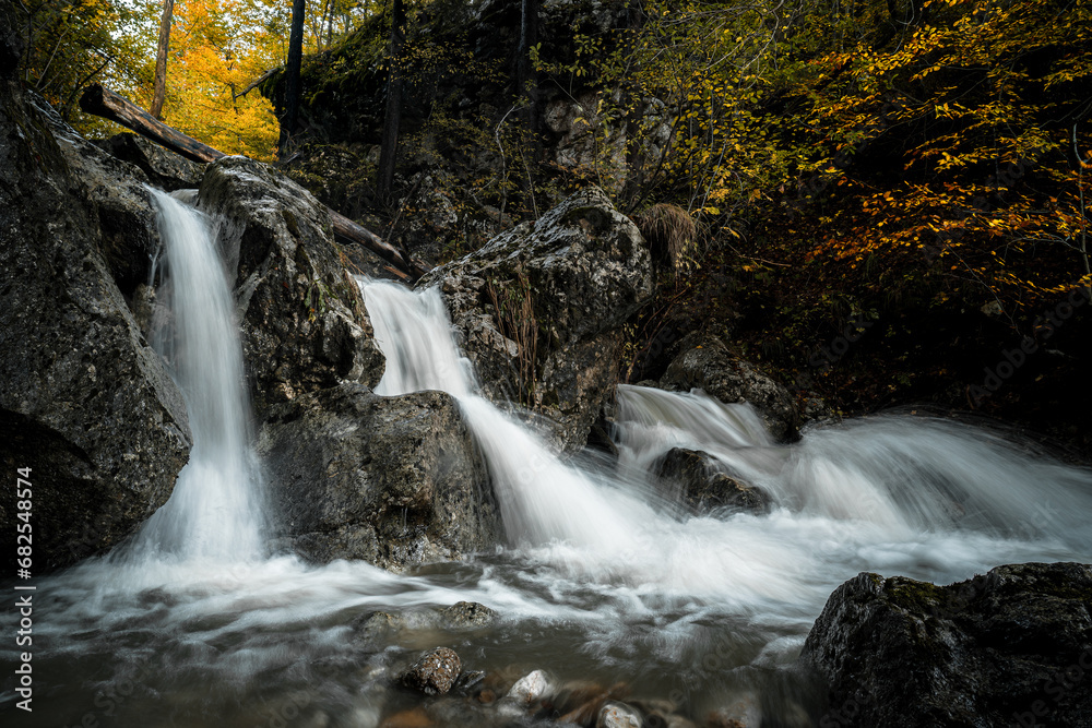 Fototapeta premium Waterfall on a small stream in autumn