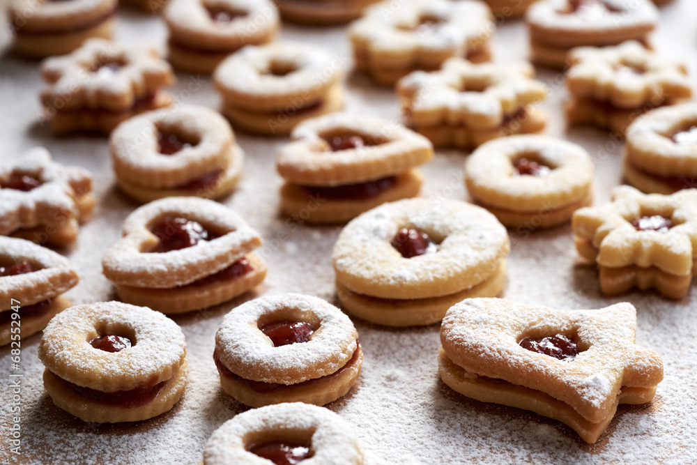 Traditonal homemade Linzer Christmas cookies dusted with sugar