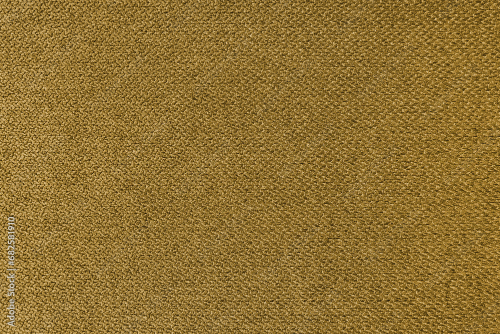 Fototapeta premium Textile background, yellow coarse fabric texture, jacquard woven upholstery, furniture textile material, wallpaper, backdrop. Cloth structure close up.