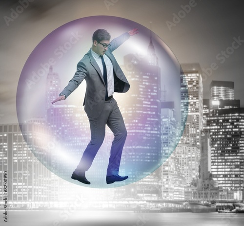 Businessman flying inside the bubble