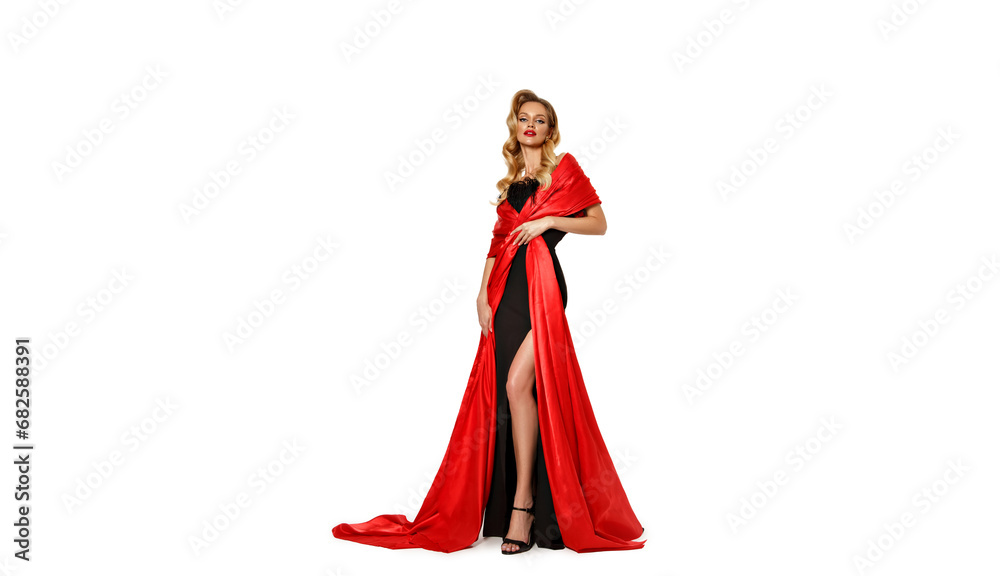 Happy New Year 2025. Female portrait. Beautiful young white blonde woman in full body in black dress, royal robe of red fabric isolated on white background. Concept of gift, Merry Christmas. Copyspace Happy New Year 2025. Female portrait. Beautiful young white blonde woman in full body in black dress, royal robe of red fabric isolated on white background. Concept of gift, Merry Christmas. Copyspace