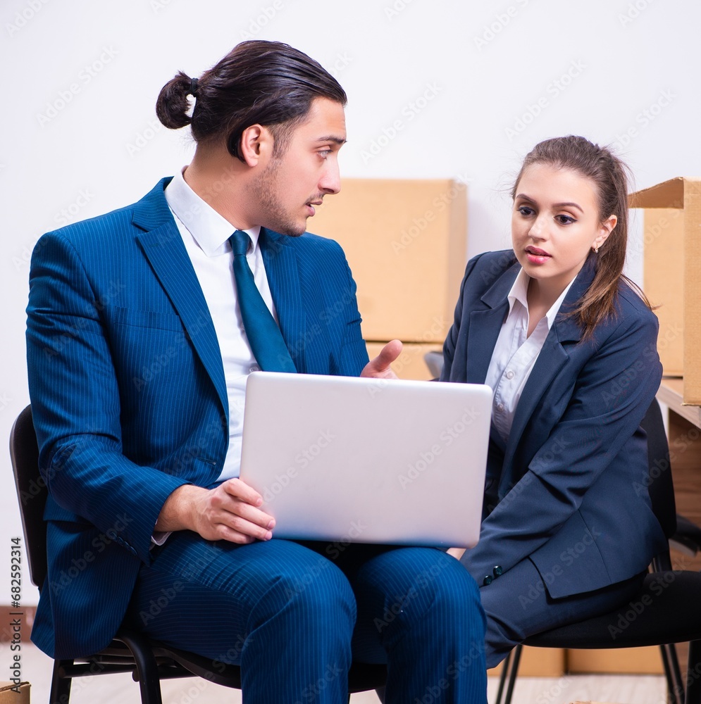 Two employees being fired from their work Two employees being fired from their work