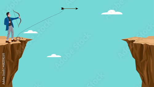 creative problem solving illustration with the concept of a businessman who uses an arrow to hook a rope to a cliff to get over it, problem solving skills, complicated solution