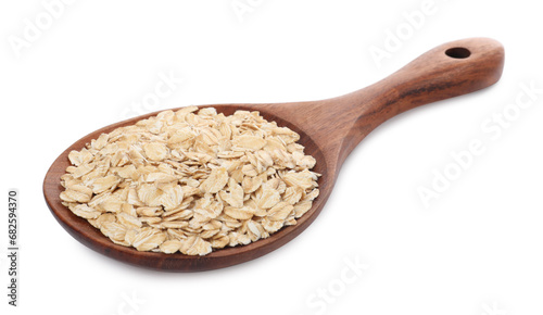 Wooden spoon of oatmeal isolated on white