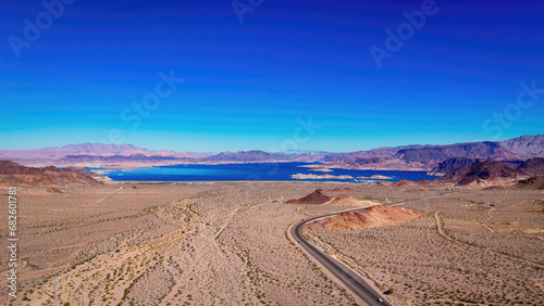 Lonesome road through the desert from above aerial view - aerial photography