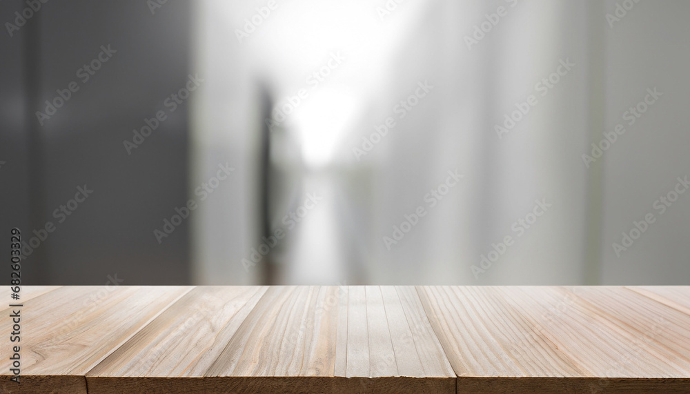 Wood table top on blurred white gray background from hallway - can be used for display or montage your products Wood table top on blurred white gray background from hallway - can be used for display or montage your products