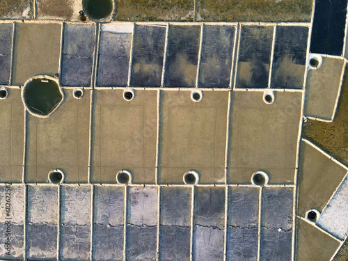 Aerial view of salt farm, Landscape and environment. Harvesting salt. Salt field yard in Kutubdia Island,  Chittagong, Bangladesh.  photo