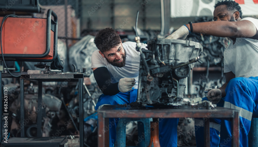 Car technician check engines, choose quality gear for precise repairs to ensure optimal performance Car technician check engines, choose quality gear for precise repairs to ensure optimal performance