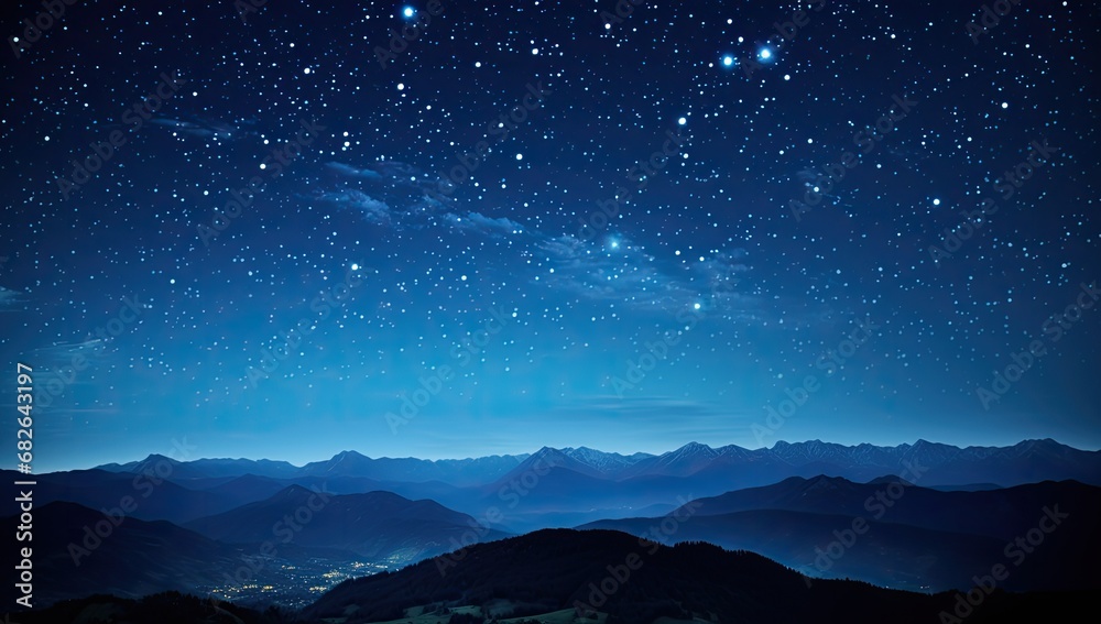 Starry Night Over Tranquil Mountain Range
