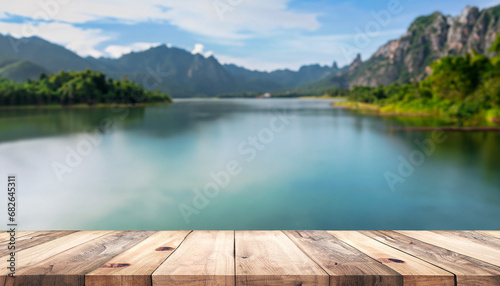 Wood table top and blurred lake & mountain background - can used for display or montage your products.
