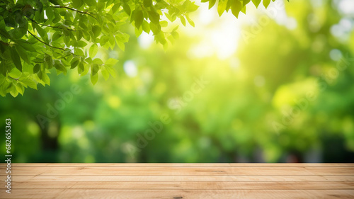 Empty wood table top and blurred green tree in the park garden photo