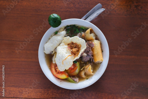 Top view of traditional Soto Mie Bogor, a famous traditional dish from West Java, Indonesia photo