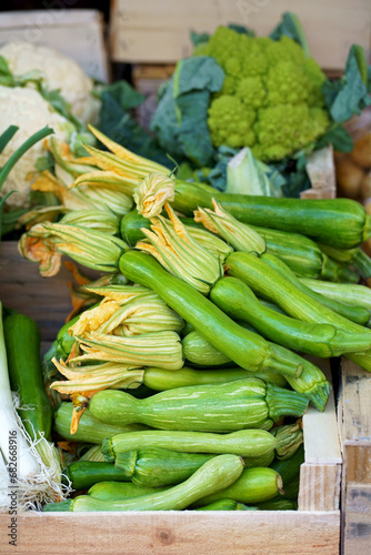 Nice. French market. Fresh zucchini with flowers sold at the market. Zucchini flowers are used in traditional French cuisine