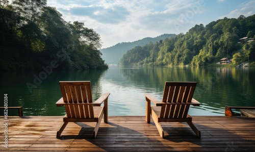 Two Rustic Wooden Chairs on a Serene Wooden Dock Overlooking the Water