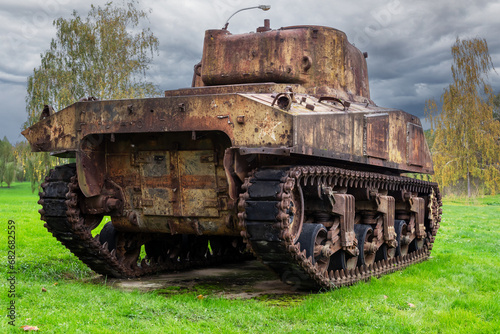 back view of rusty sherman tank, wwii armoured vehicle photo