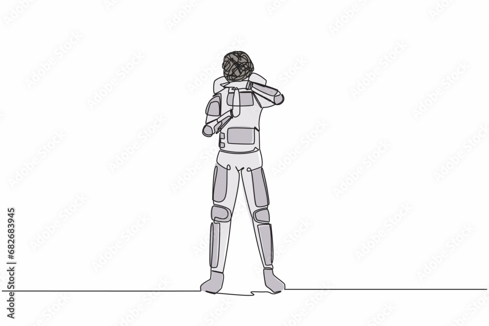 Fototapeta premium Single one line drawing astronaut with round scribbles instead of head. Stop working, time break gesture, timeout signal. Pause. Cosmic galaxy space. Continuous line graphic design vector illustration