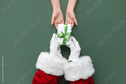 Santa claus hands giving a ...