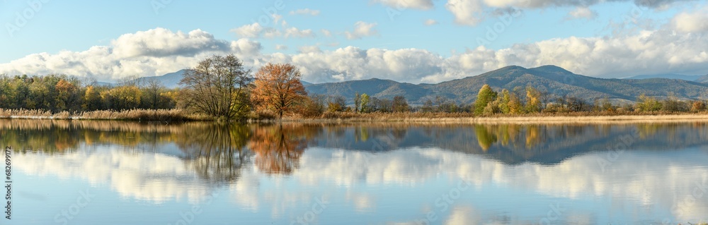 Flooded meadow after heavy rains. Autumn landscape. Panoramic, panorama.