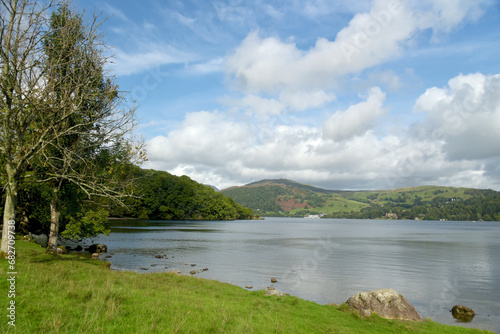 The shores of the lake of Windermere by Wray Castle in the Lake District photo