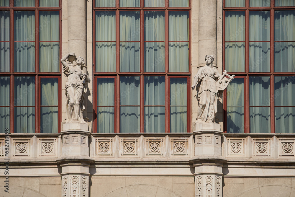Statues on exterior of a Vigadó (Place for Merrimen) buildlng, Budapest's second largest concert hall, located on the Eastern bank of the Danube. Budapest, Hungary - 7 May, 2019