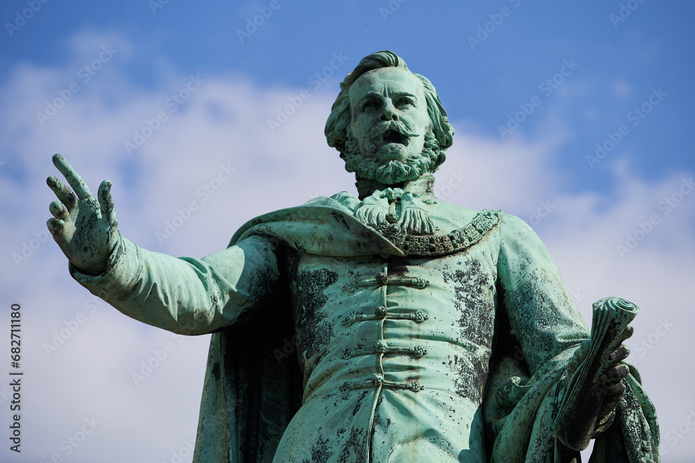 Fototapeta premium Monument of Hungarian writer and politician Joseph von Eotvos (Hungarian: Baron József Eötvös). Budapest, Hungary - 7 May, 2019
