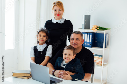 Family photo of mom with dad and son with daughter