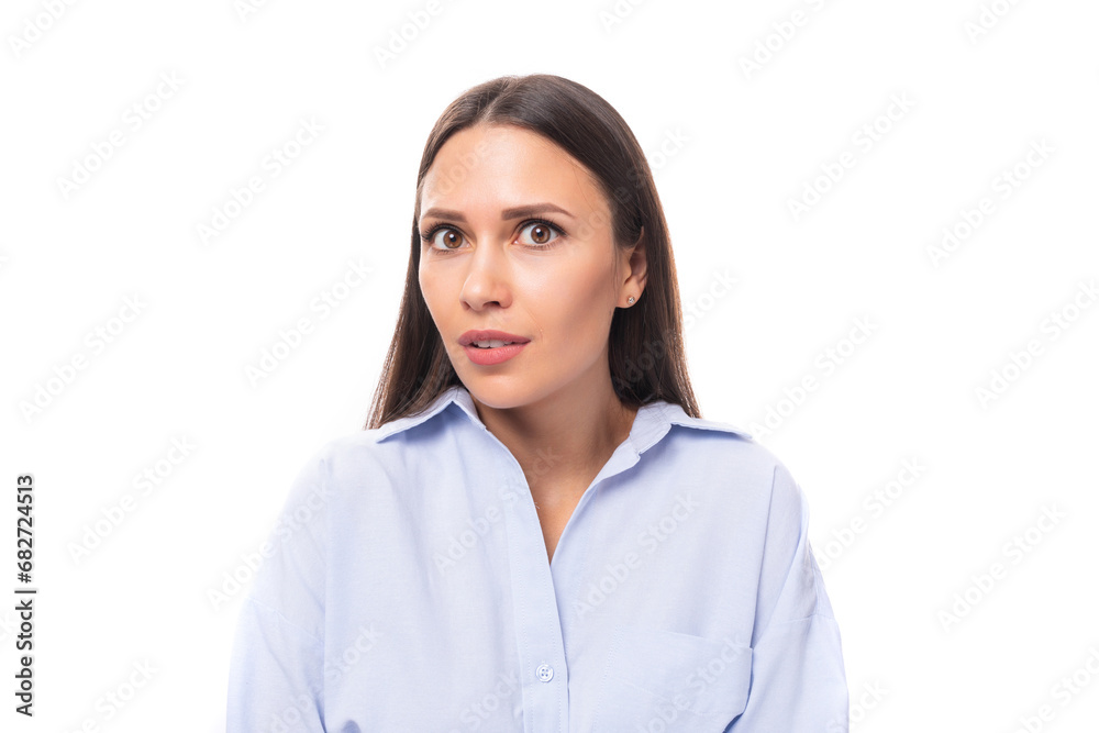 close-up portrait charming young brunette european woman dressed in sky blue shirt over isolated background with copy space close-up portrait charming young brunette european woman dressed in sky blue shirt over isolated background with copy space