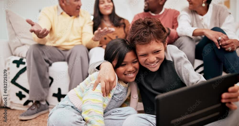 Tablet, happy and children in the living room playing a game together for entertainment and fun. Laughing, smile and young kids watching a funny video on digital technology in the lounge at home.