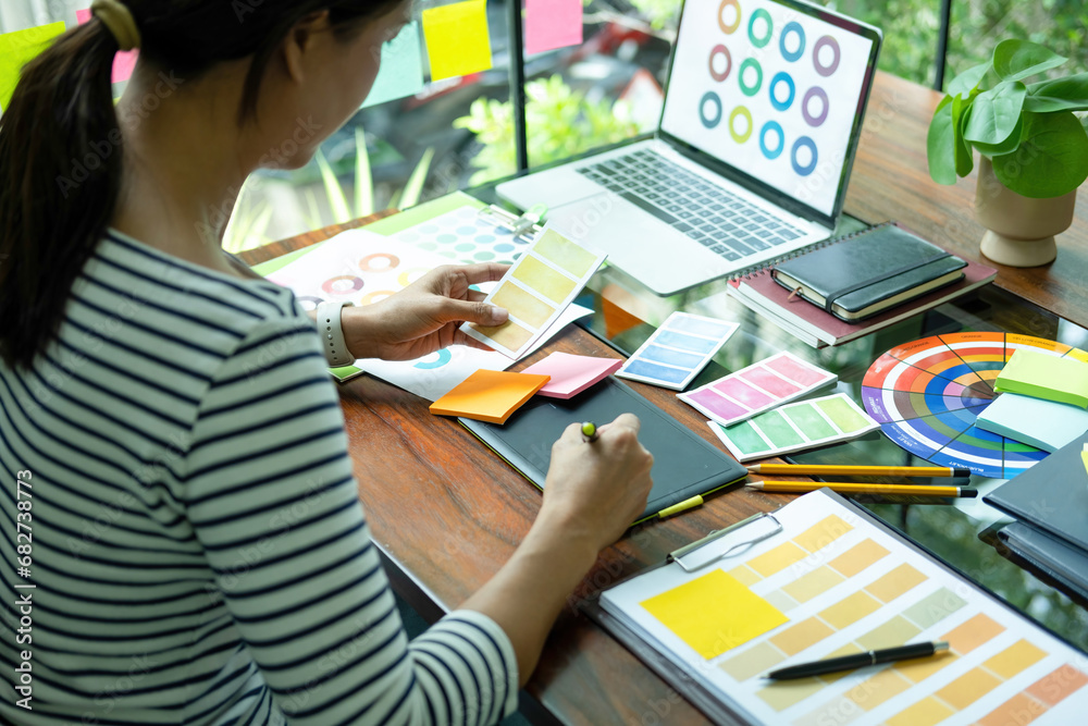 Female architect envisions project with technology. Female architect envisions project with technology.