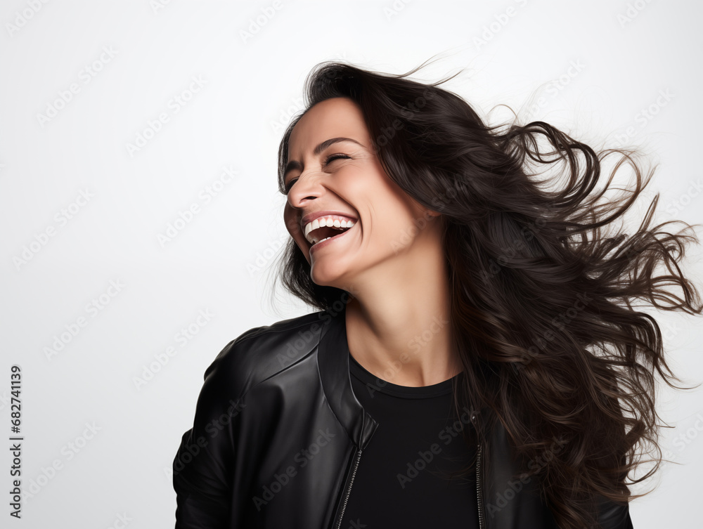 A beautiful middle-aged woman laughs. Full mouth smile. Isolated on white background
A beautiful middle-aged woman laughs. Full mouth smile. Isolated on white background