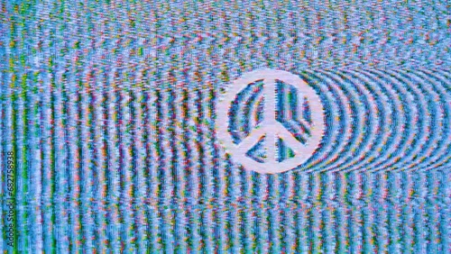 Repeating peace sign glitches with blue and green noise static photo