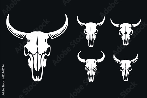 Beautiful cow skull on a black background. Vector illustration set. photo