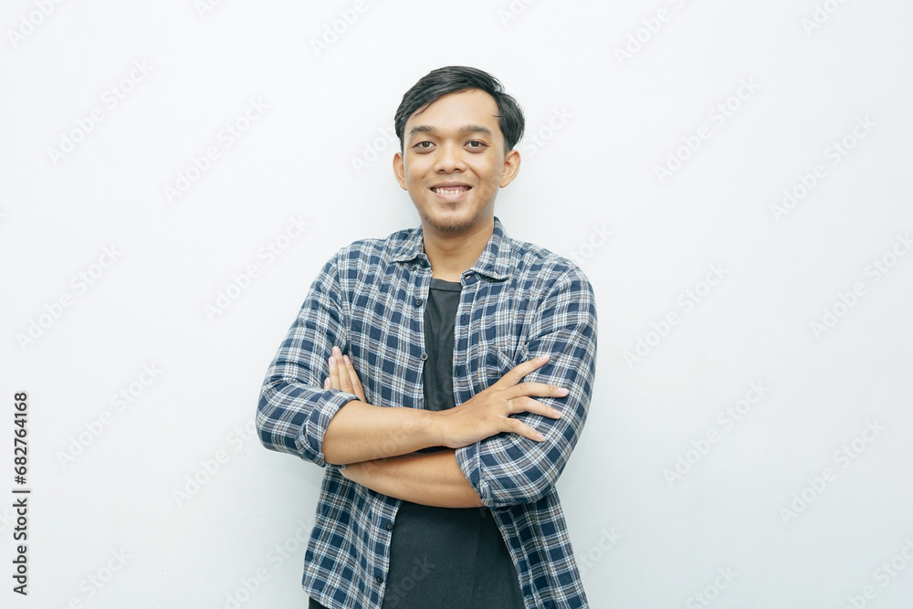 Portrait Indonesian Asian young man smiling. Casual concept isolated white background Portrait Indonesian Asian young man smiling. Casual concept isolated white background