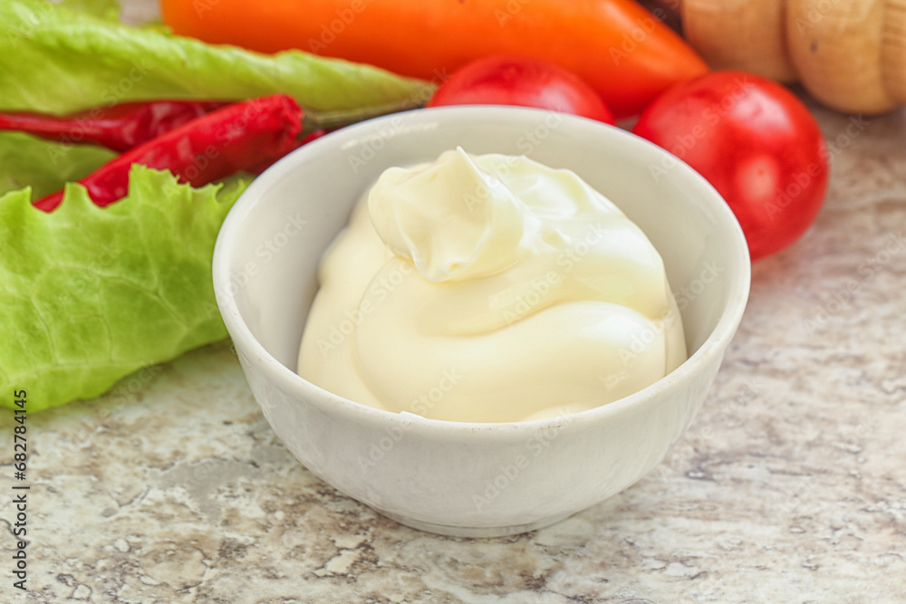 Organic mayonnaise sauce in the bowl Organic mayonnaise sauce in the bowl