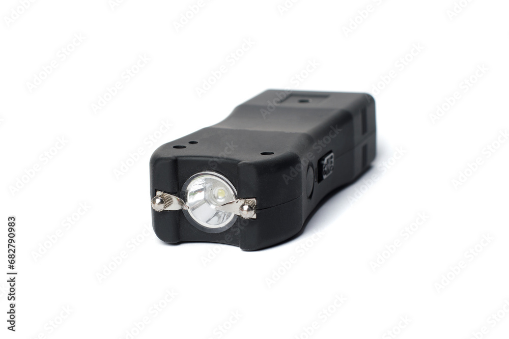 Black Shock stun gun with flashlight isolated on white background Black Shock stun gun with flashlight isolated on white background