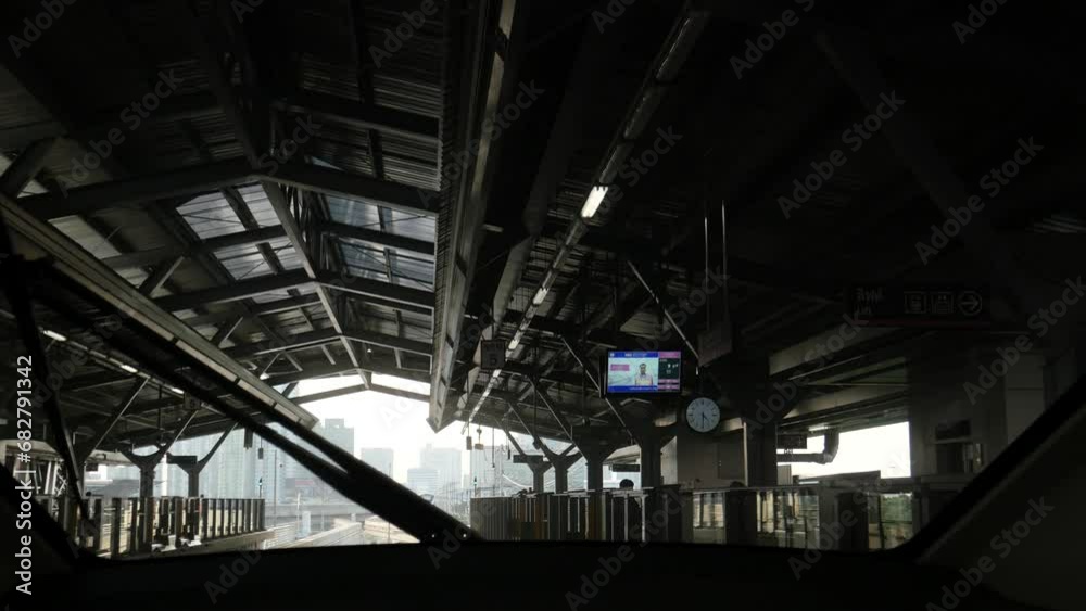 Monorail train is leaving the platform. It is a city train line connecting Bangkok and neighboring provinces. Monorail train is leaving the platform. It is a city train line connecting Bangkok and neighboring provinces.