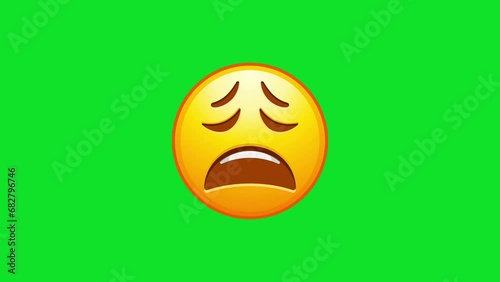 Exhausted emoji. Tired emoticon, yellow face with X-shaped scrunched eyes Animated Emoji. Alpha channel, transparent background. 4K resolution loop animation.