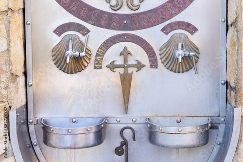 Wine and water tap in Irache winery, Road to Santiago de Compostela, Navarre, Spain photo
