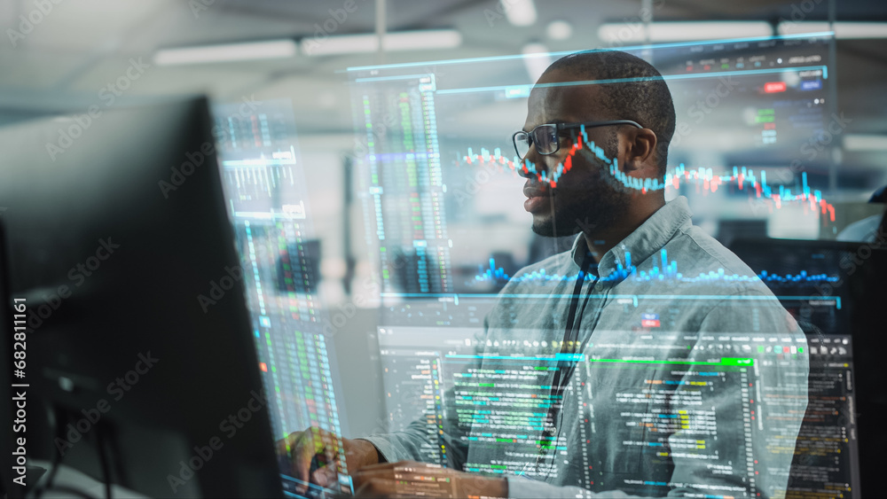 Futuristic Office with Hologram Screens Concept: Portrait of Professional Black Specialist Working on Desktop Computer with Holographic Projection Showing Stock Market Information, Big Data, Charts Futuristic Office with Hologram Screens Concept: Portrait of Professional Black Specialist Working on Desktop Computer with Holographic Projection Showing Stock Market Information, Big Data, Charts