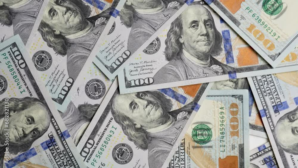 American one hundred dollar paper money moving close-up