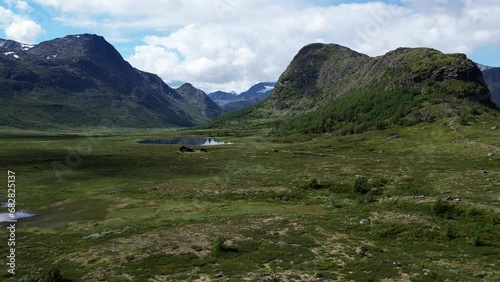 Aerial view above Jotunheimen Norway - Glacier fed lakes in the highlands and valleys of Central Norway photo