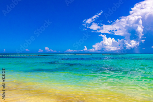 Tropical Caribbean beach clear turquoise water Playa del Carmen Mexico. © arkadijschell