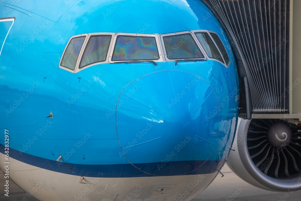 A close-up photograph of a commercial wide-body jetliner