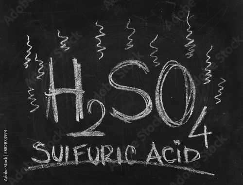 Icon H2SO4, sulfuric acid hand draw chalk on chalkboard, blackboard texture