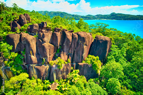 Drone of rock boulders and lush vegetation, Mahe, Seychelles
