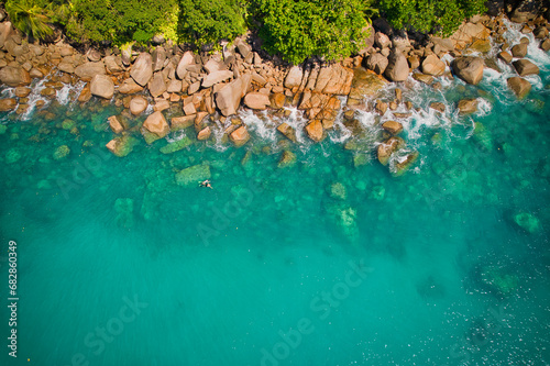  Bird eye drone of turquoise transparent water, corals and rocks, Mahe Seychelles 2
